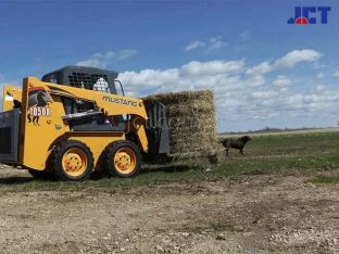 xe xuc lat skid loader mustang 1050r